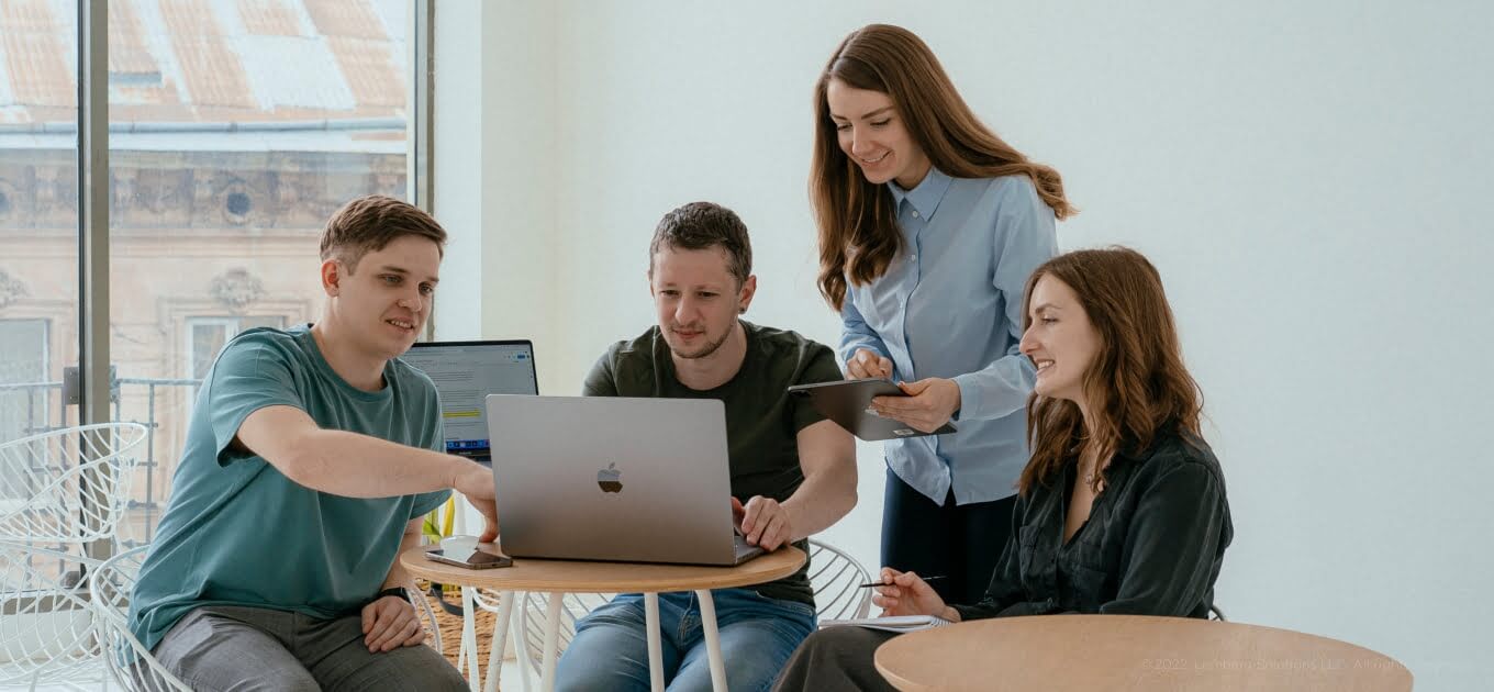 Group of people discussing the project - A Guide to Effective Embedded Development Project Estimation - Lemberg Solutions.jpg Group of people discussing the project - A Guide to Effective Embedded Development Project Estimation - Lemberg Solutions.jpg