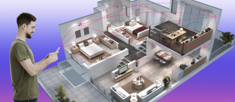 A man with smartphone and a smart building - Lemberg Solutions